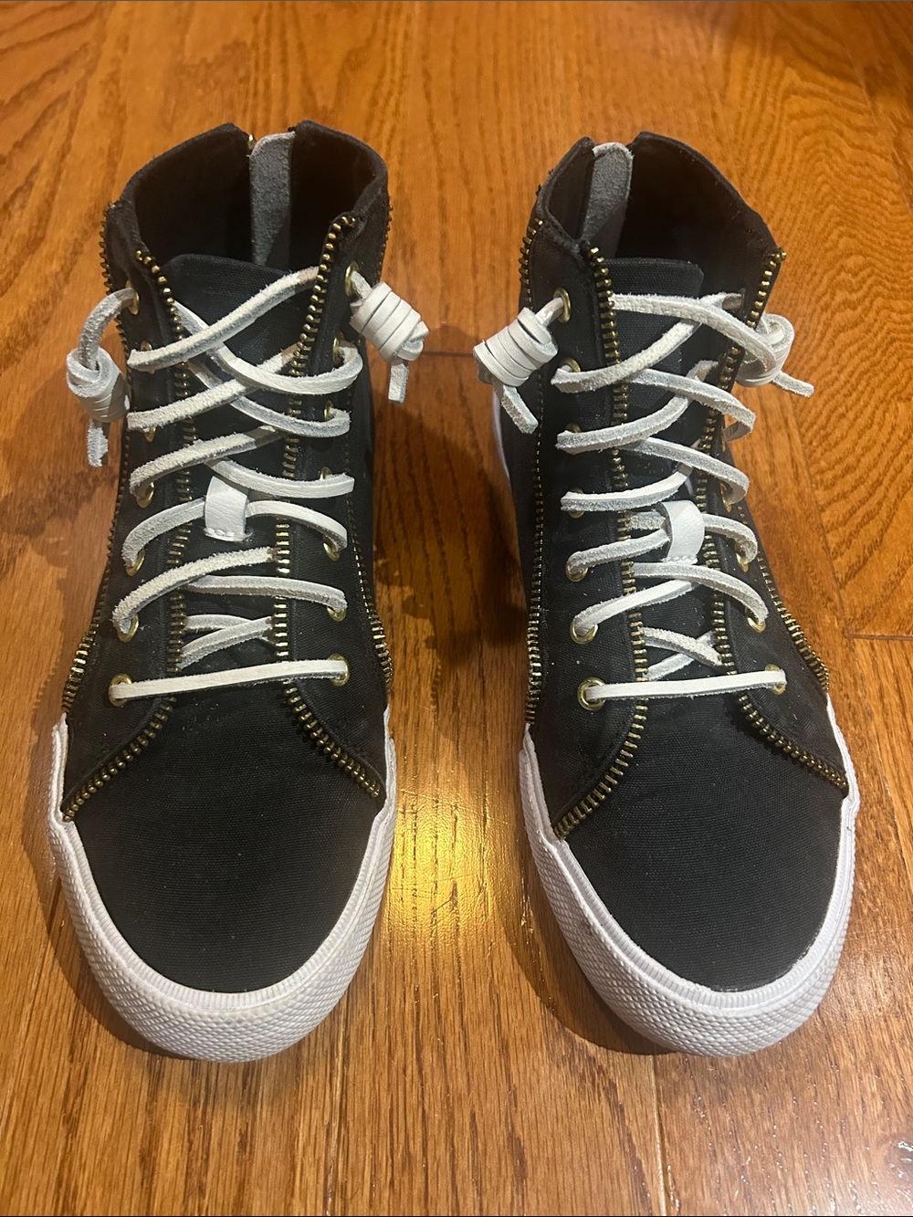 Women’s Sperry x Rebecca Minkoff Black High-Top Sneakers with gold zipper trim